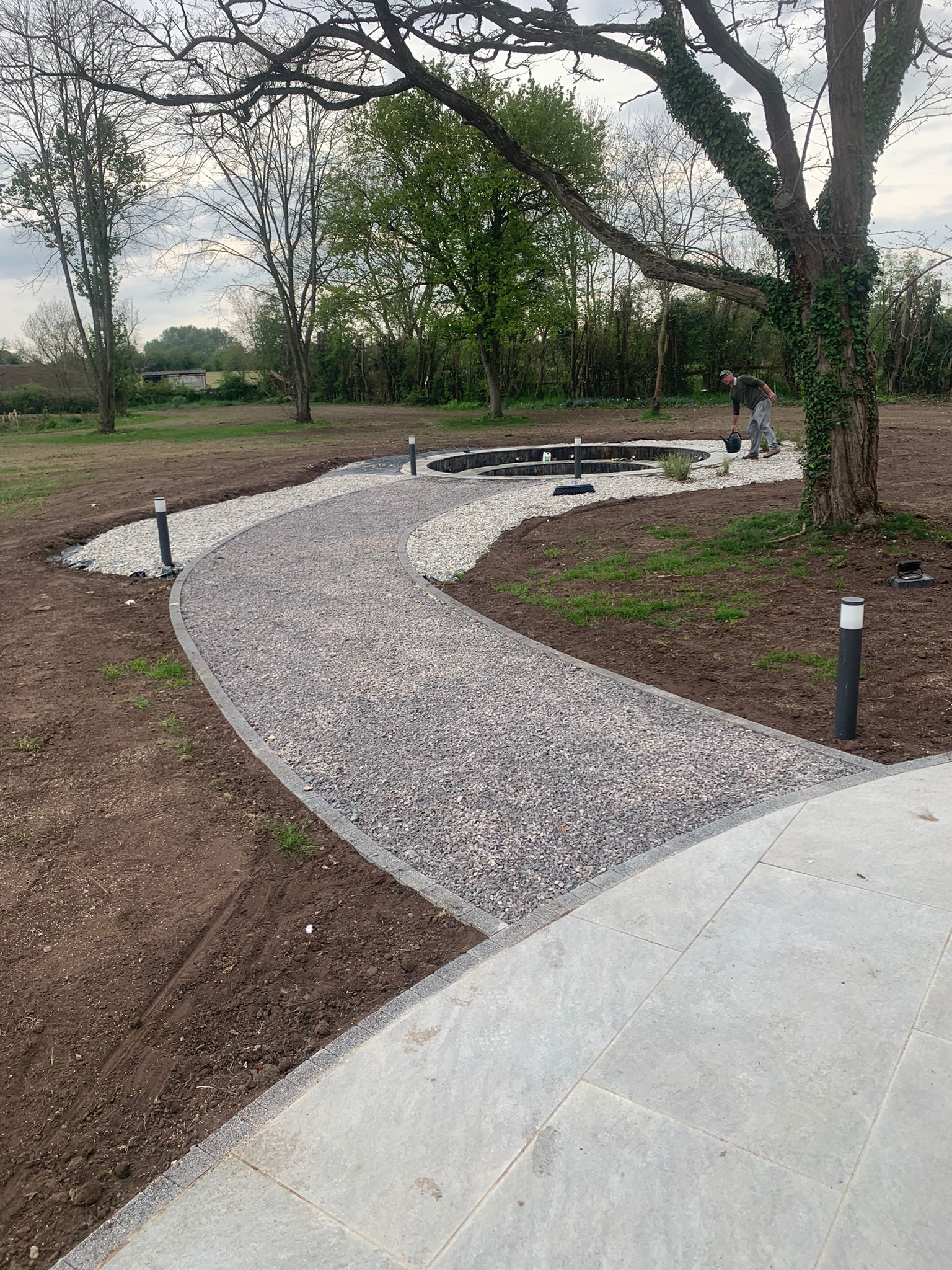 The Old Orchard - During - pathway laid and surrounding stones laid