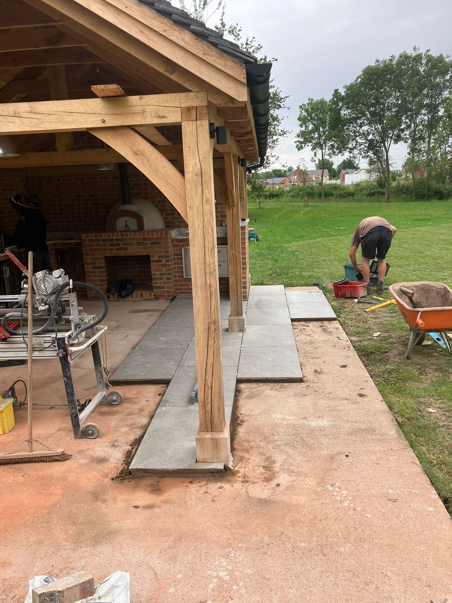 The Old Orchard - During - outdoor shelter built and flooring laid