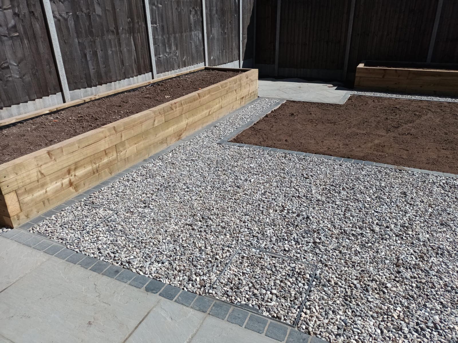 Cottage of Suburbia - During - stones laid for surrounds