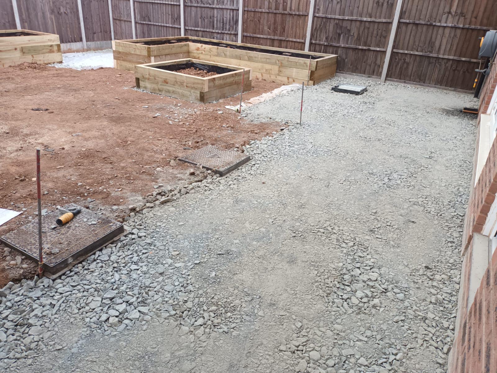 Cottage of Suburbia - stone laid and raised flower beds